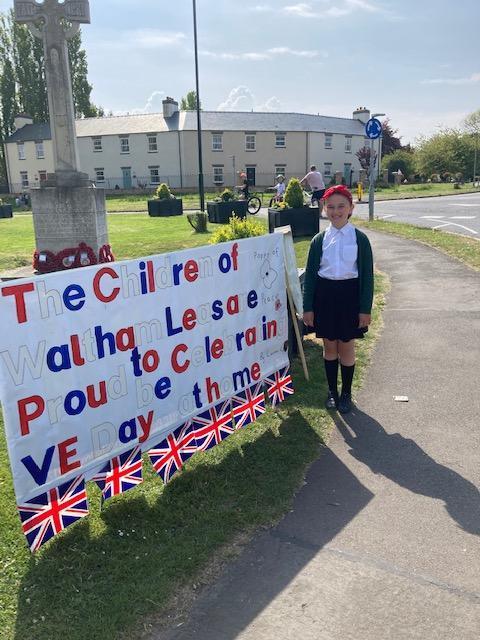LG with the Waltham Leas VE Day 75 banner
